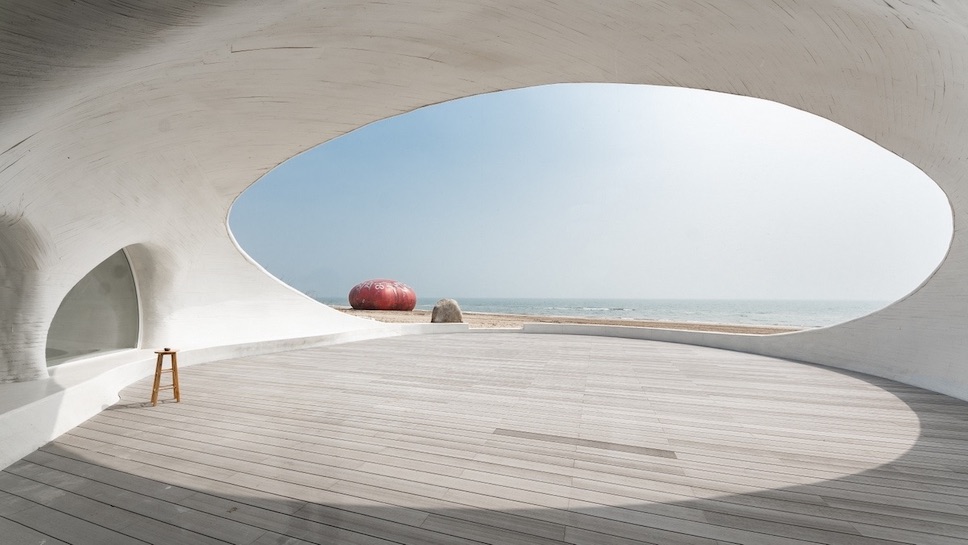 Openings in the UCCA Dune Art Museum look out to the stunning ocean