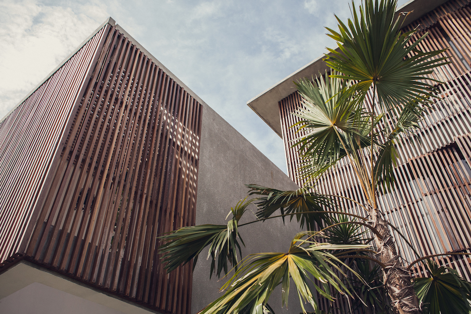 Timber and concrete form the exterior of the boutique accommodation